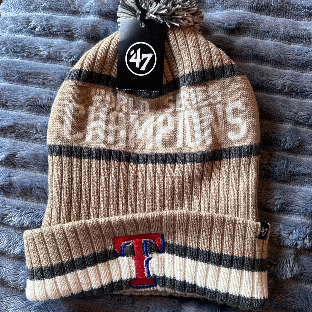 Brand New with tags.  Tan and Black World Series Champions Beanie